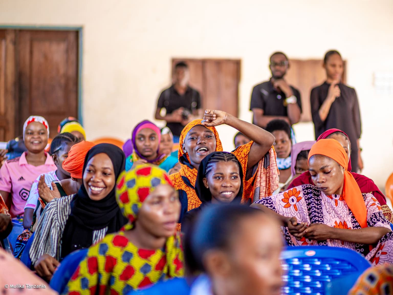 Youth group members following a training discussion